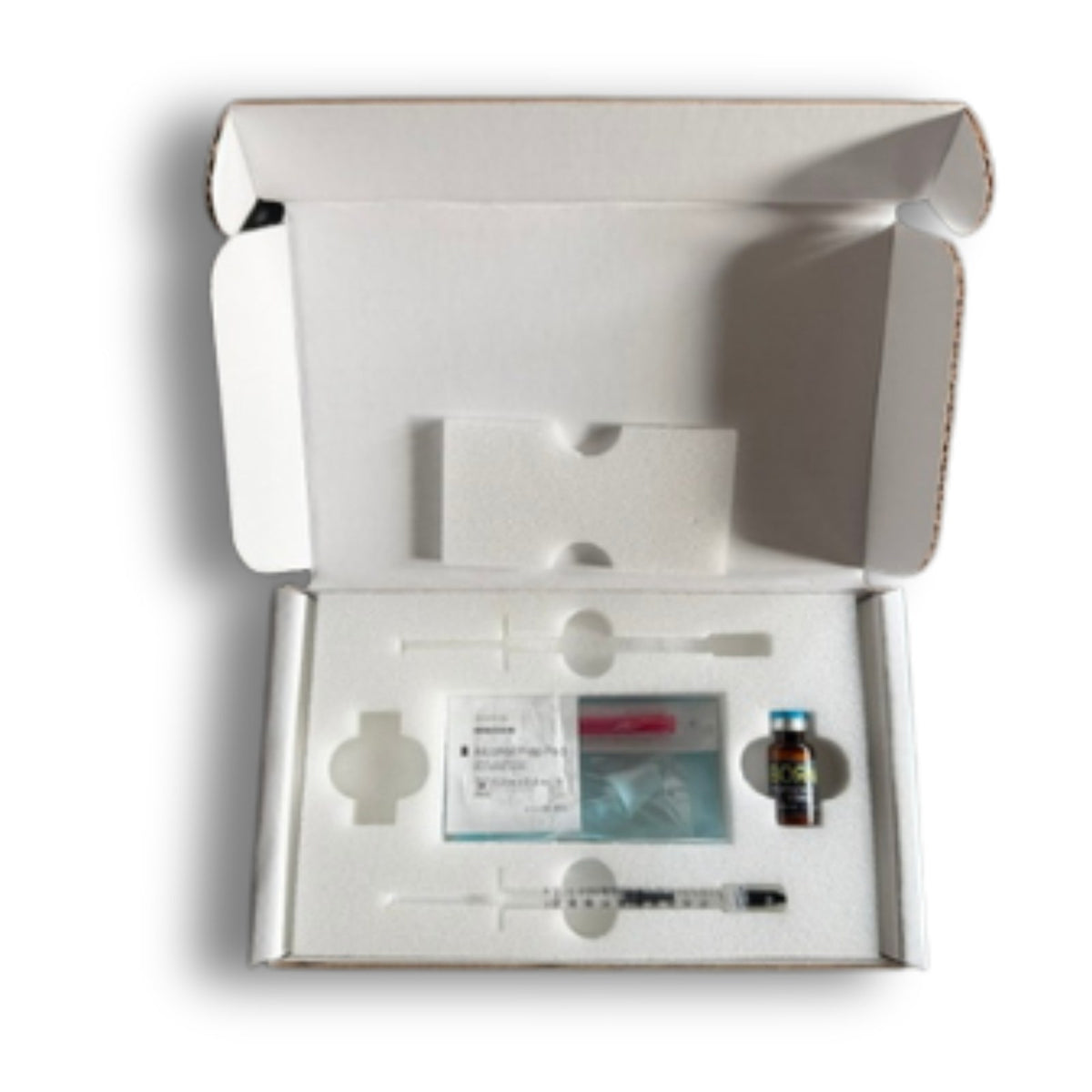 Rebornix at-home kit in shipping box, top view